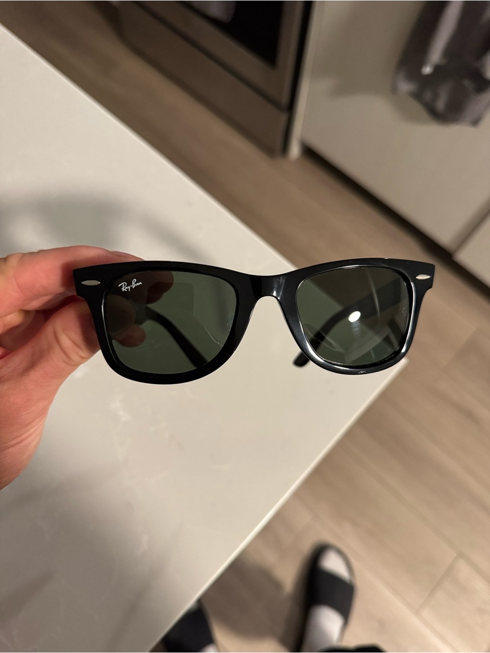 Ray-Ban Black Frame Sunglasses with Green Lenses